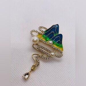 Elegant Gold and Blue Brooch with Pearls